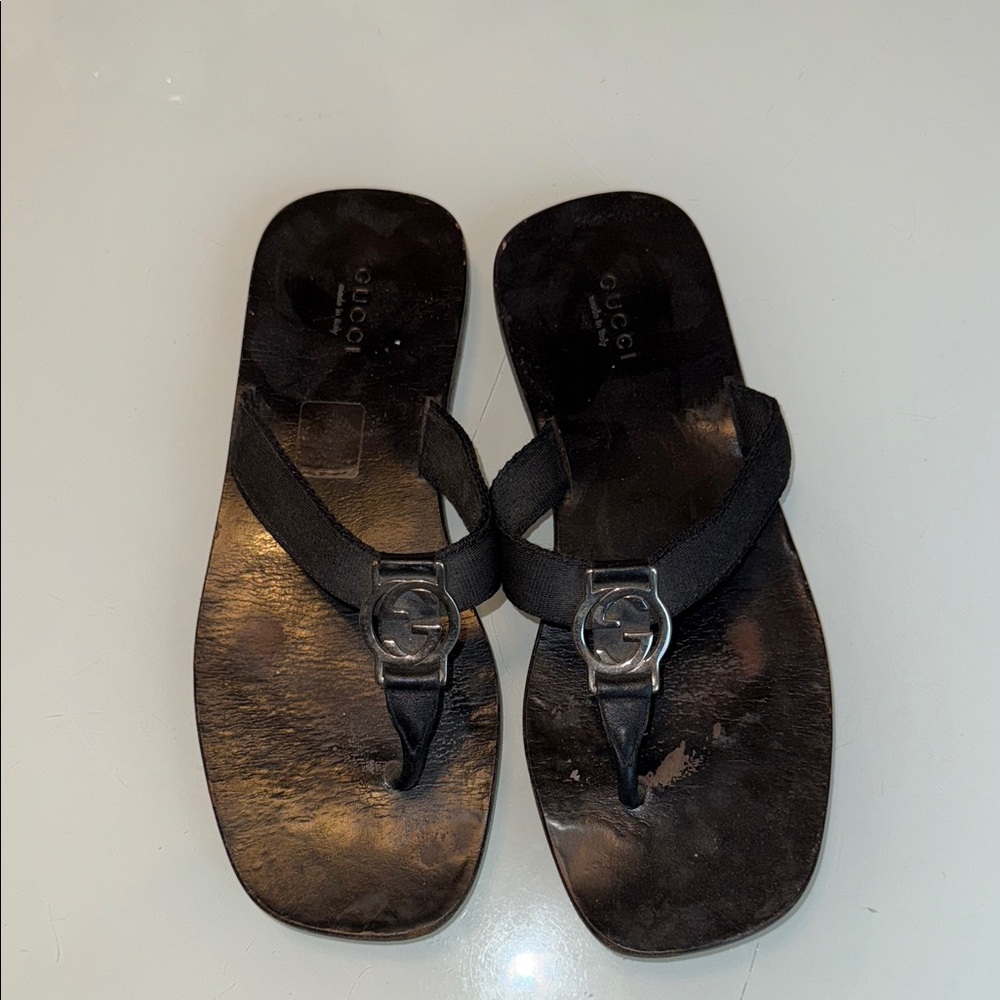 Gucci Black Flip Flops with Silver Emblem